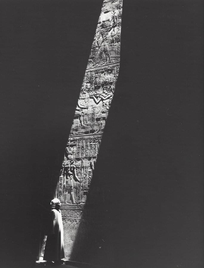 Unknown guard against one of the walls of the Edfu Temple, an unknown photographer