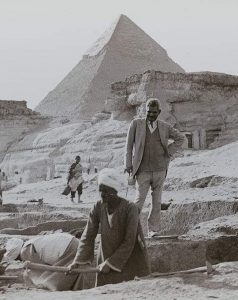 Dr. Selim Hassan in one of his excavations at Gize with unknown workers in the 1930s